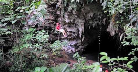 Cave rappelling and zip-lining safari in San Juan